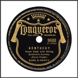 Conqueror Record Label: 1938-1942. Black color with shield.